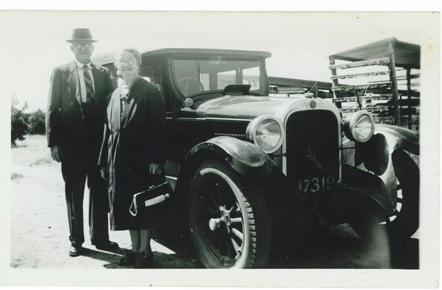 The Ingerson family beside the farm car, 1930